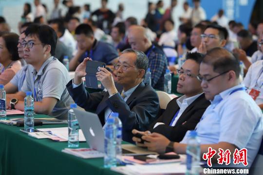 研討會現(xiàn)場圖?！■暮陚?攝